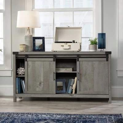 Bridge Acre Rustic Farmhouse Credenza TV Stand for TVs up to 58" Mystic Oak - Sauder 5 Bridge Acre Rustic Farmhouse Credenza TV Stand for TVs up to 58" Mystic Oak - Sauder - Image 3